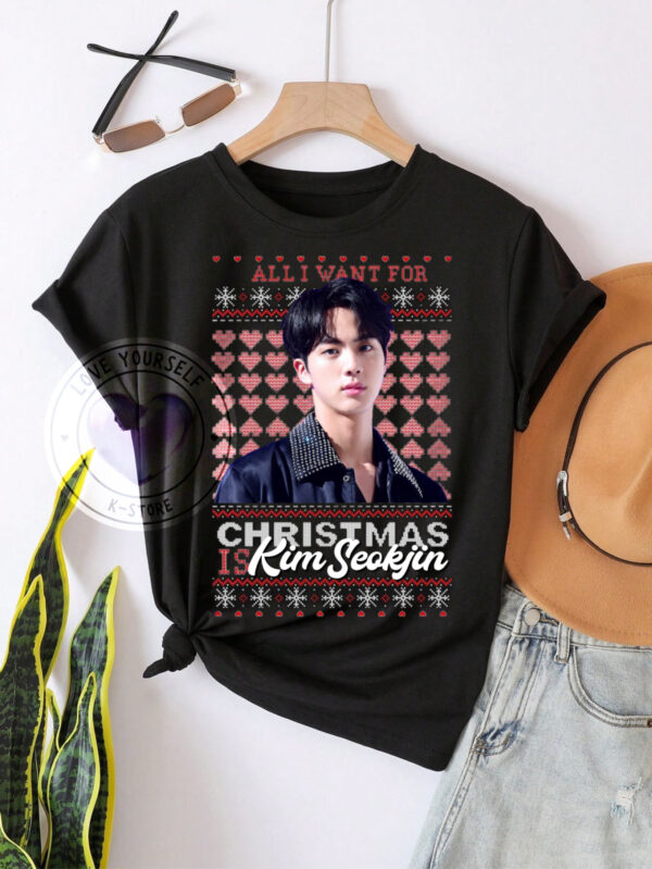 JIN NAVIDAD POLERA NEGRA