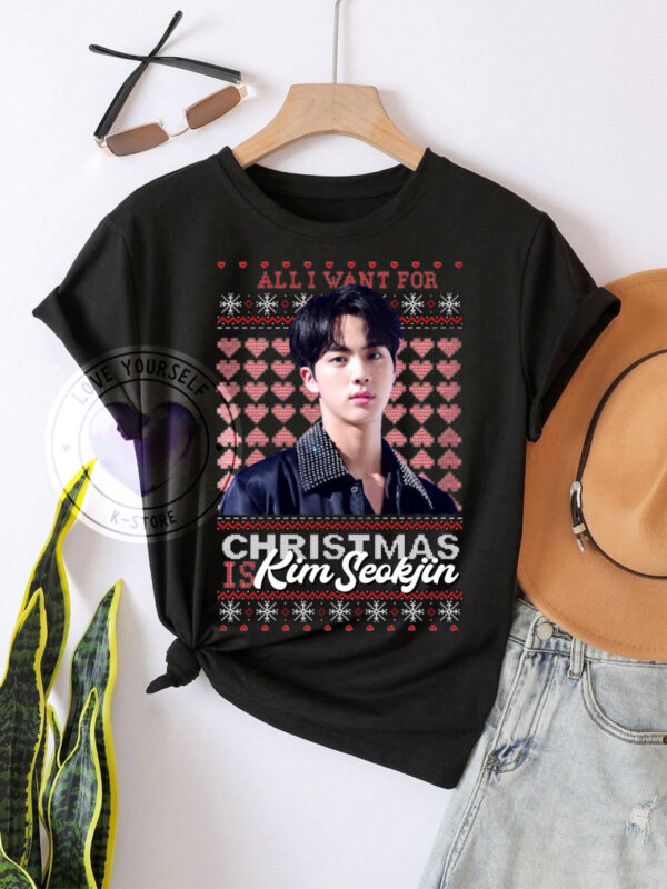 JIN NAVIDAD POLERA NEGRA