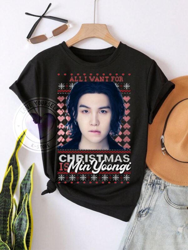 SUGA NAVIDAD POLERA NEGRA